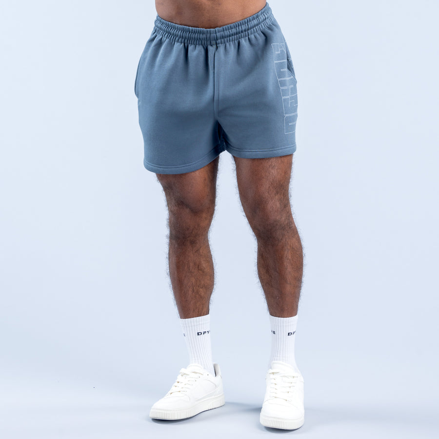 Slate blue graphic shorts with elastic waistband and side logo print