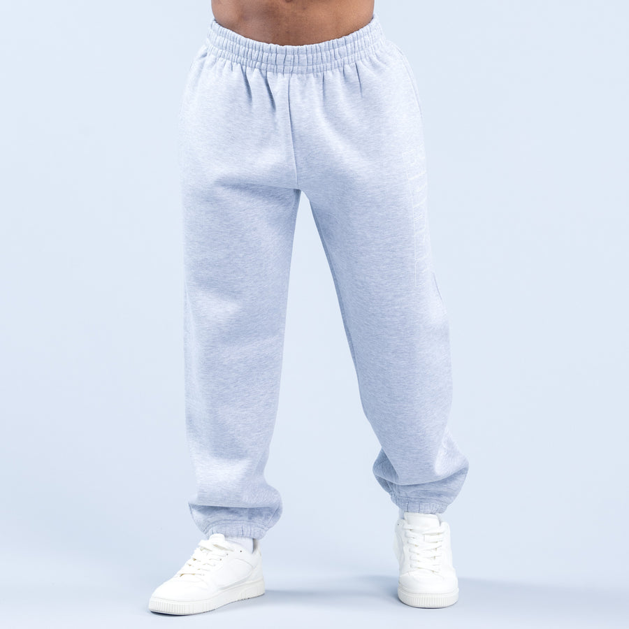 Light blue joggers with elastic waistband, tapered legs, and ribbed cuffs