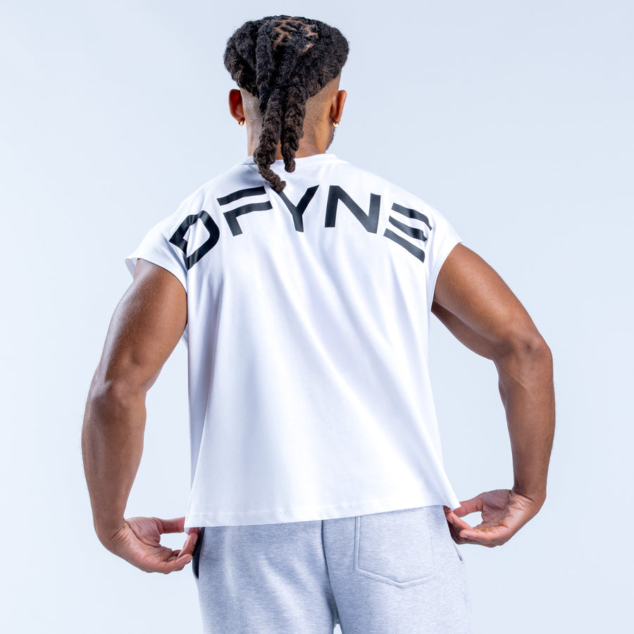 White crop tank top from back view with large DFYNE lettering across shoulders.