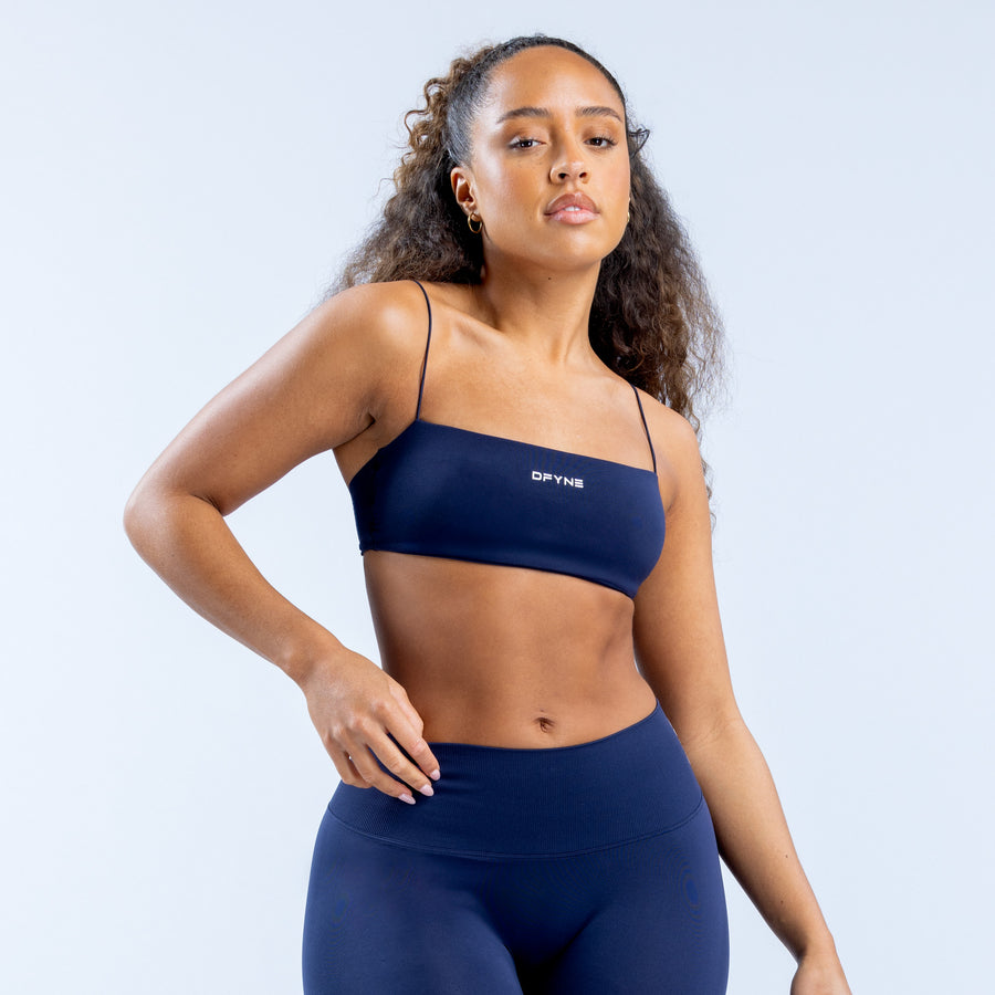 Strappy bra in dark navy with thin spaghetti straps and supportive elastic band
