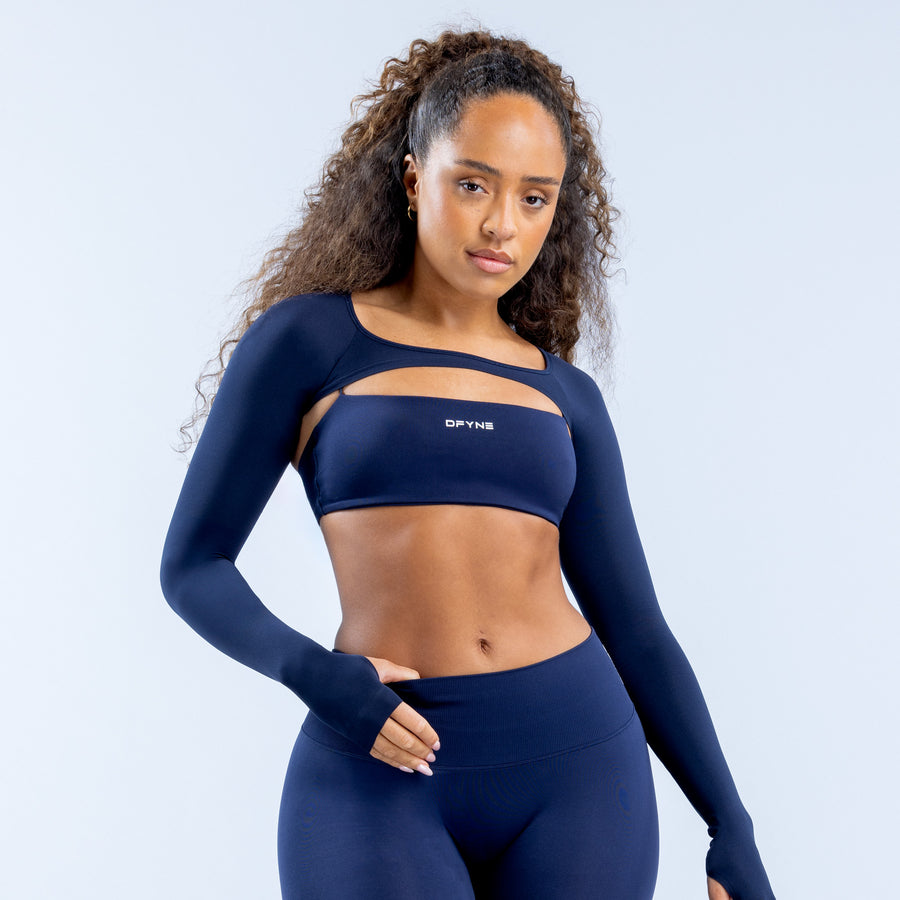 Dark blue fitted long-sleeve athletic shrug with cropped hem