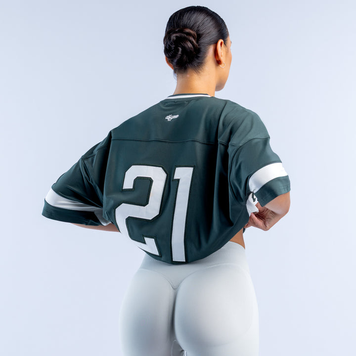 Dark green short sleeve top, back print '21' with white sleeve stripe trim