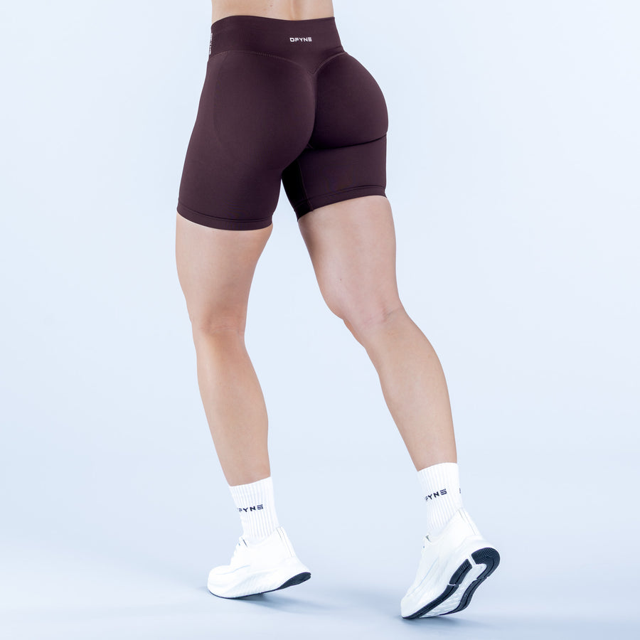 Impact shorts 6.5-inch, dark plum with contoured back panels and waistband logo
