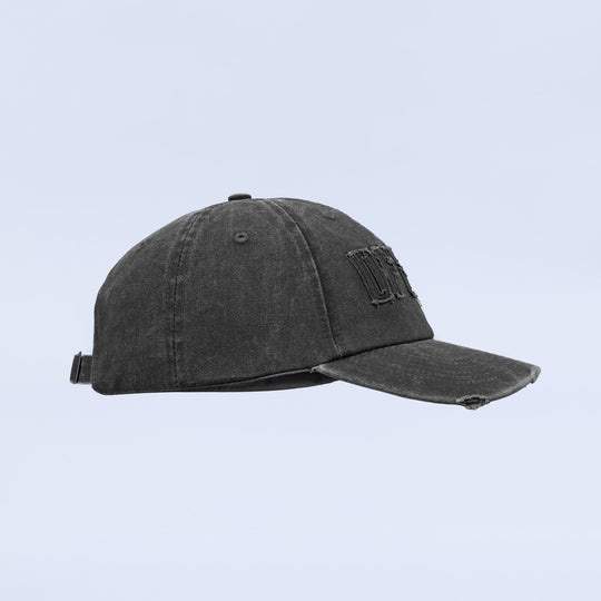 Distressed baseball cap, dark washed fabric with curved brim and side logo embroidery