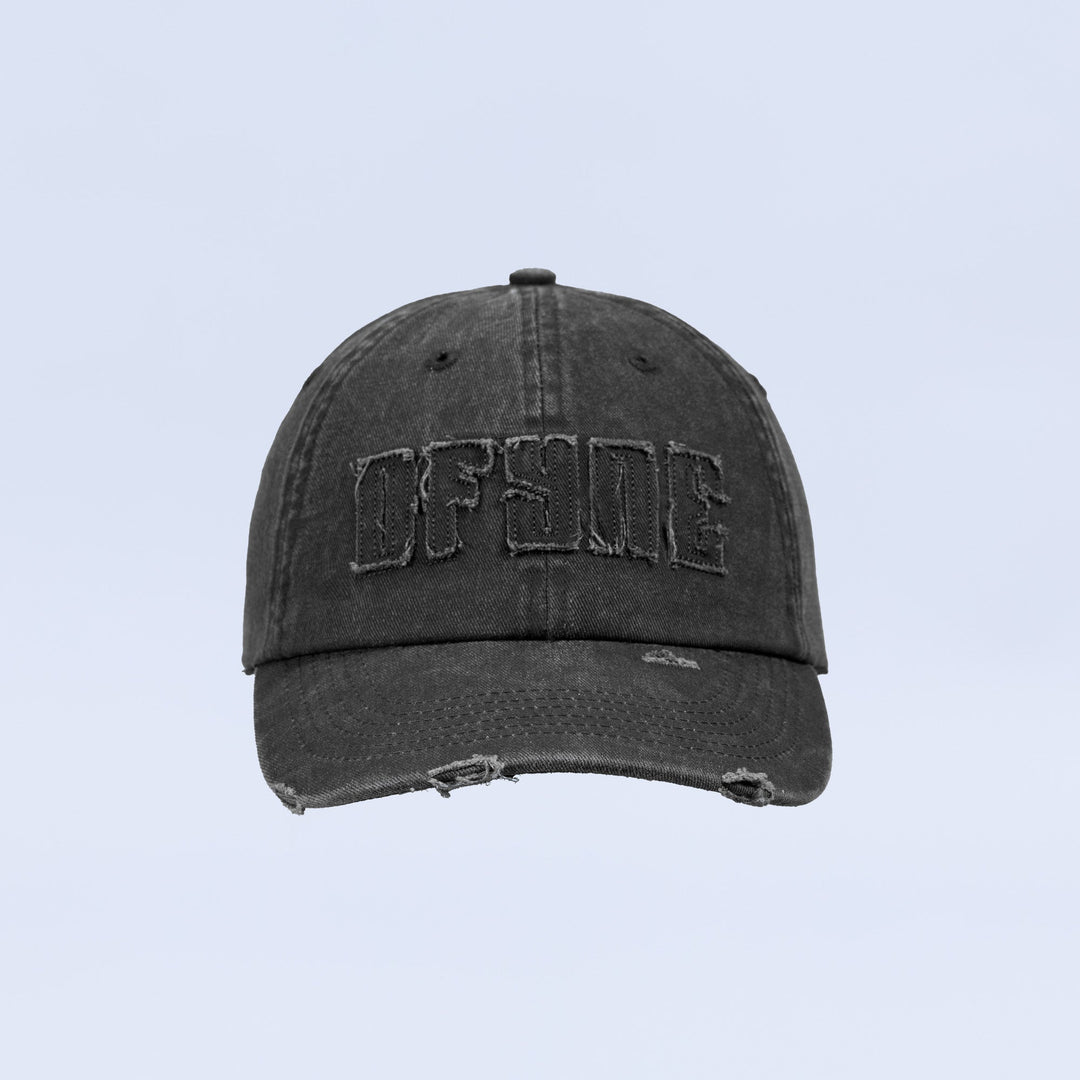 Distressed baseball cap with dark washed finish and curved brim, front embroidered logo