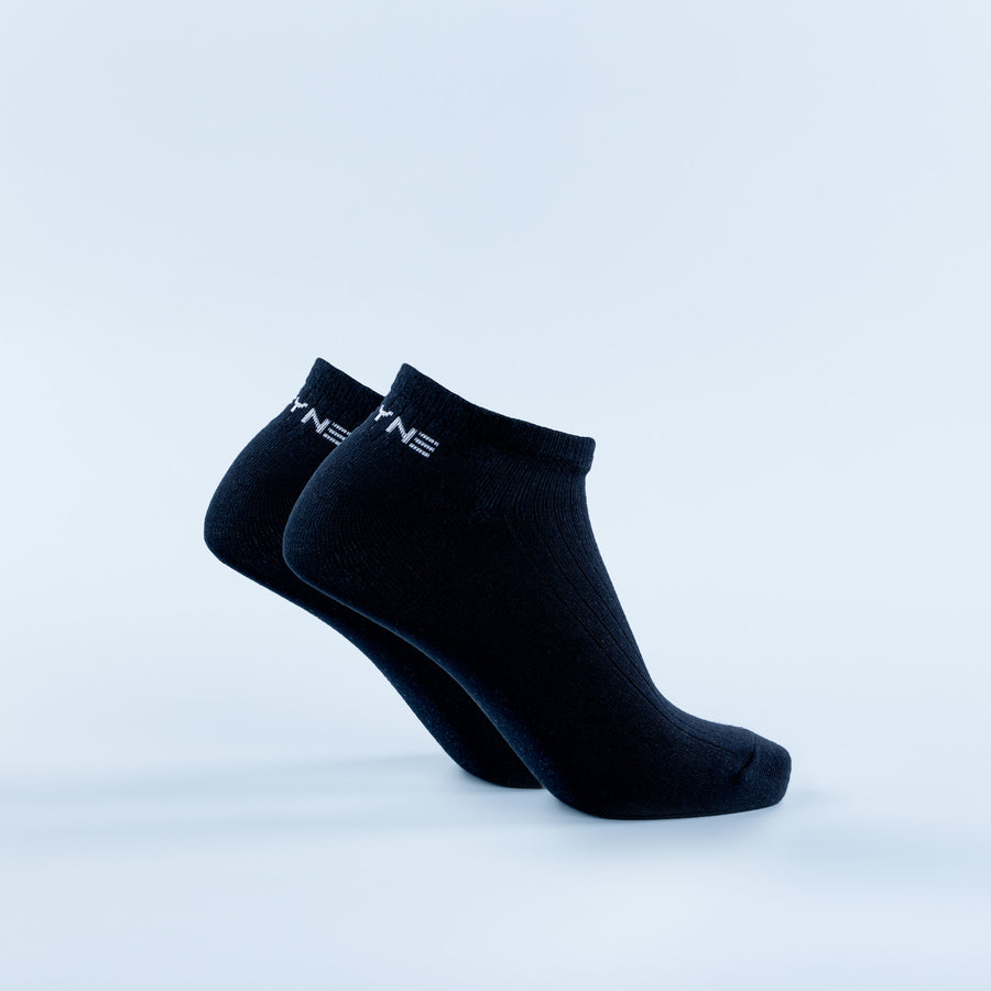 Dark navy ankle socks with white logo at cuff, knit pair view