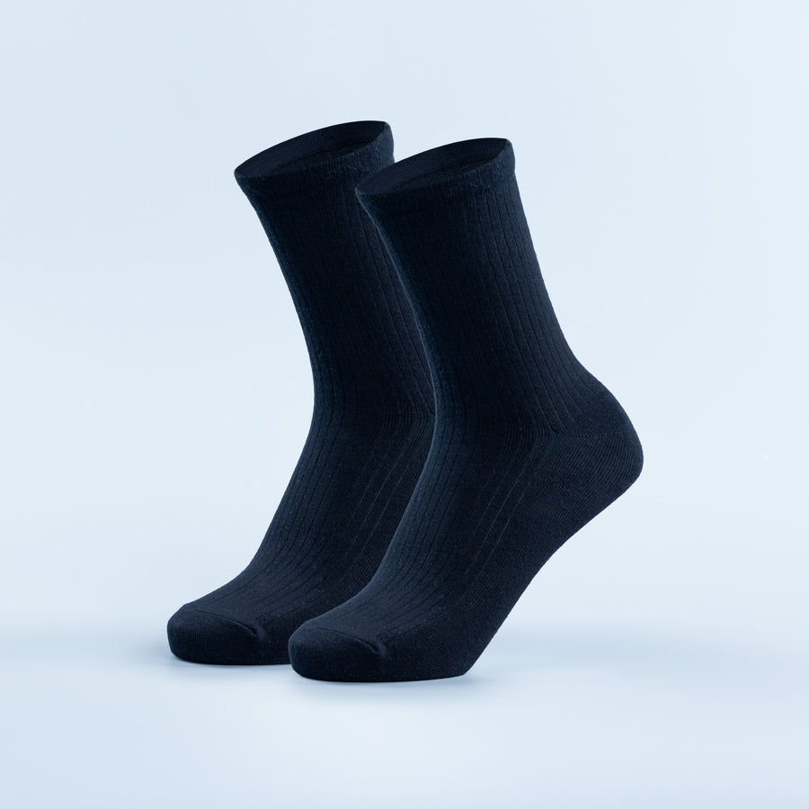 Dark navy crew socks, ribbed knit, two pairs shown at ankle height