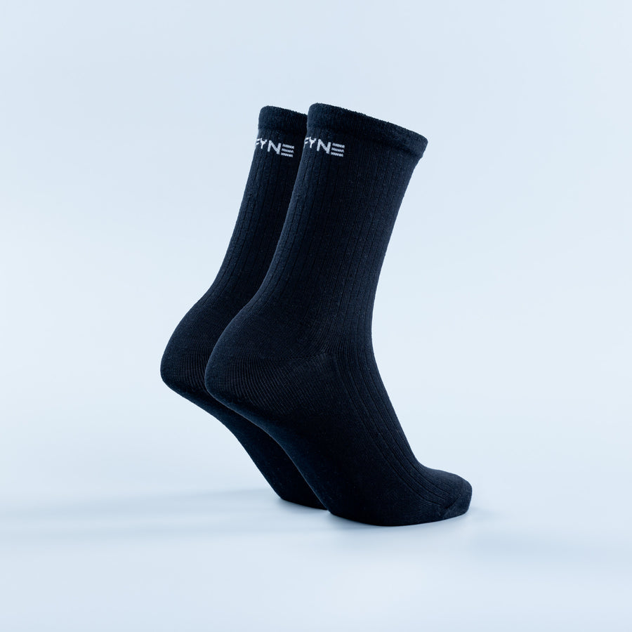 Dark navy crew socks with ribbed texture, side view of two socks