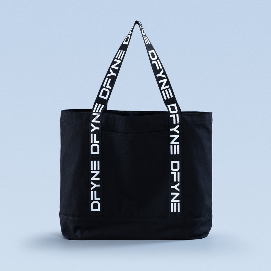 Black canvas tote bag with wide top handles and vertical side logo stripes