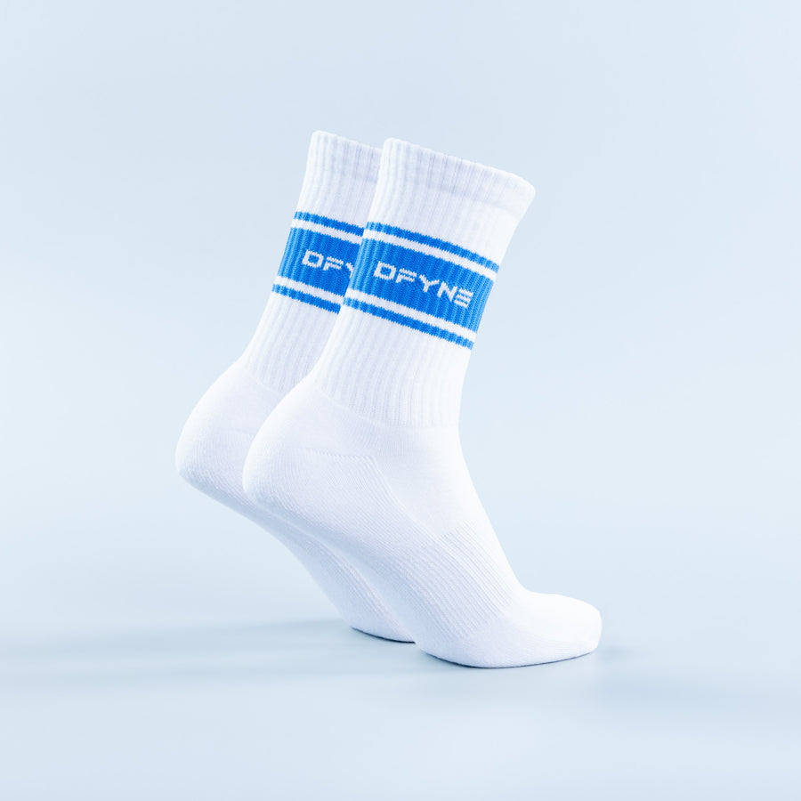 White crew socks with blue stripe and logo on the cuff