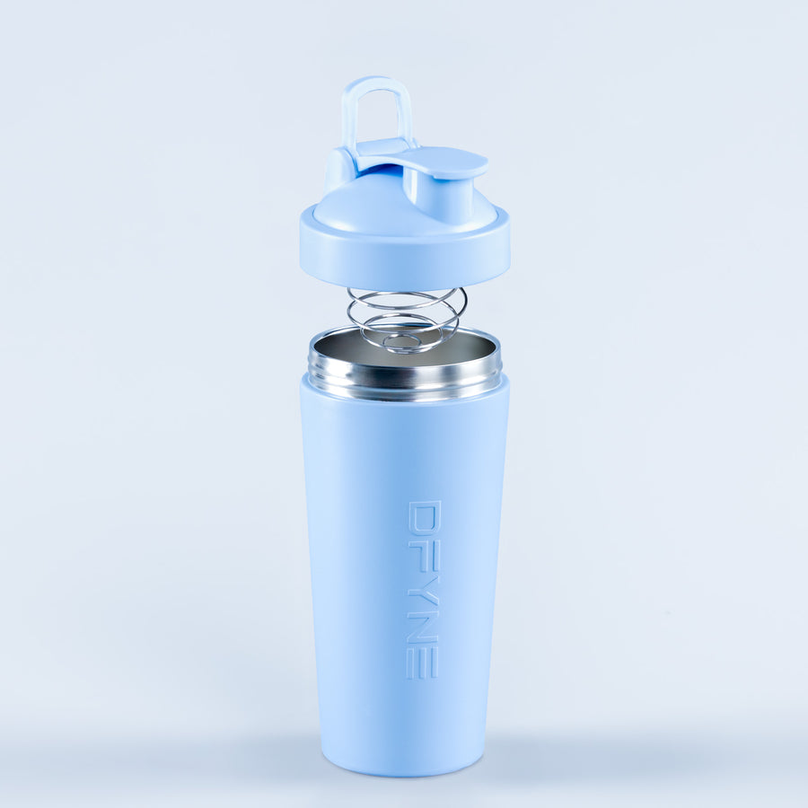 Light blue shaker bottle with flip lid, spring coil, and metal base ring