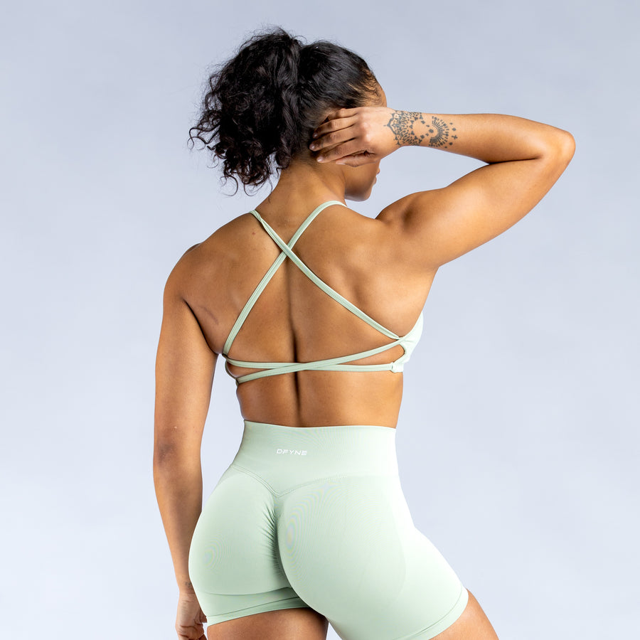 Mint backless sports bra with open back and crisscross halter straps
