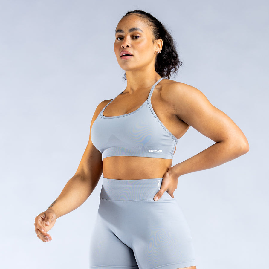 Light blue backless sports bra with thin crisscross straps