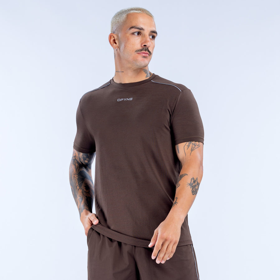 Dark brown active crewneck short-sleeve top with small chest logo, athletic fit