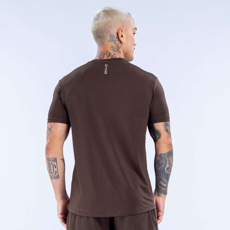 Dark brown active crewneck short-sleeve top, back view with small logo detail