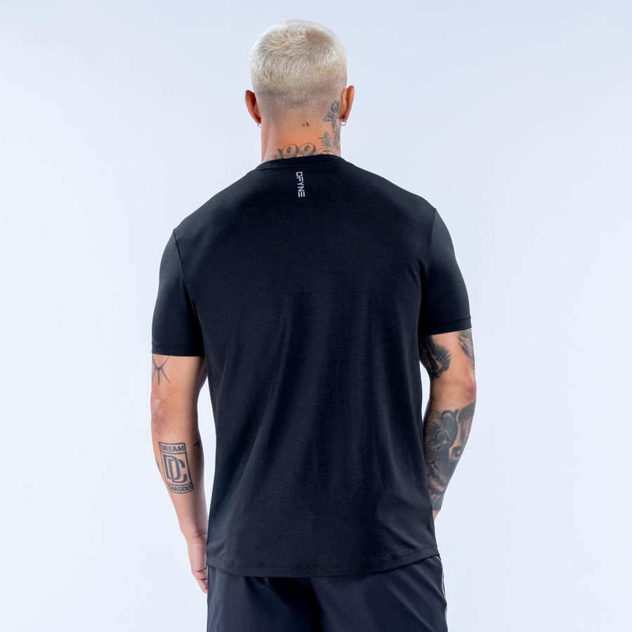 Men's black active top back view with small neck logo