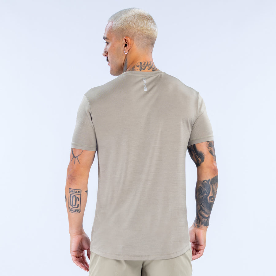Light khaki active top, crew neck, short sleeves, back view with small logo