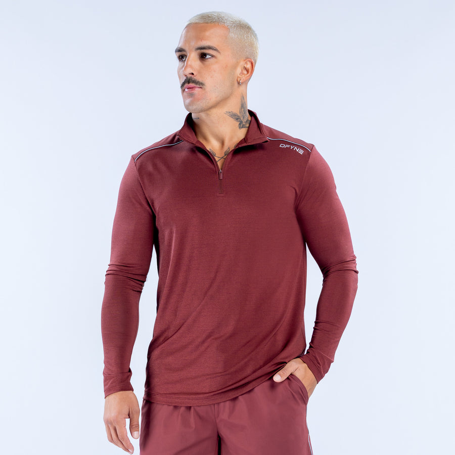 Maroon quarter-zip long-sleeve performance top with zip neck and small chest logo