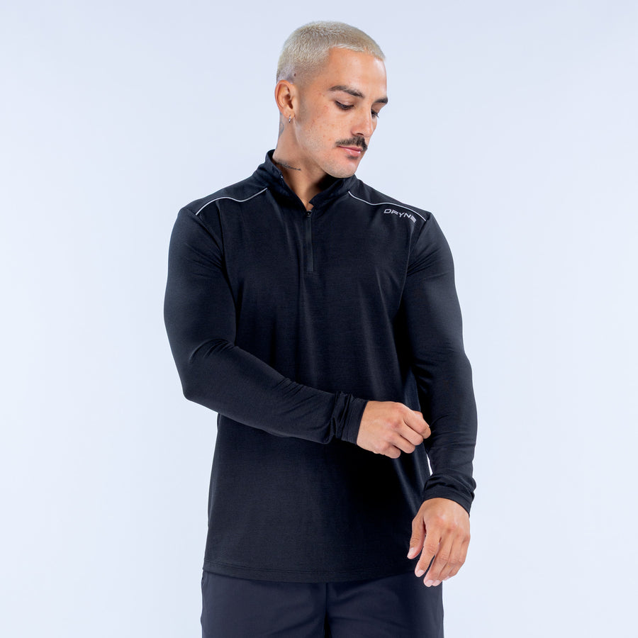 Black quarter-zip pullover with mock neck and long sleeves, close-up front view