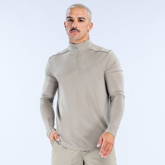 Light beige quarter-zip long-sleeve pullover with stand collar and chest zipper