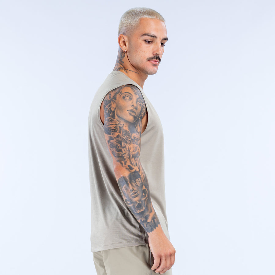 Men's light tan tank top, crew neck and sleeveless side view
