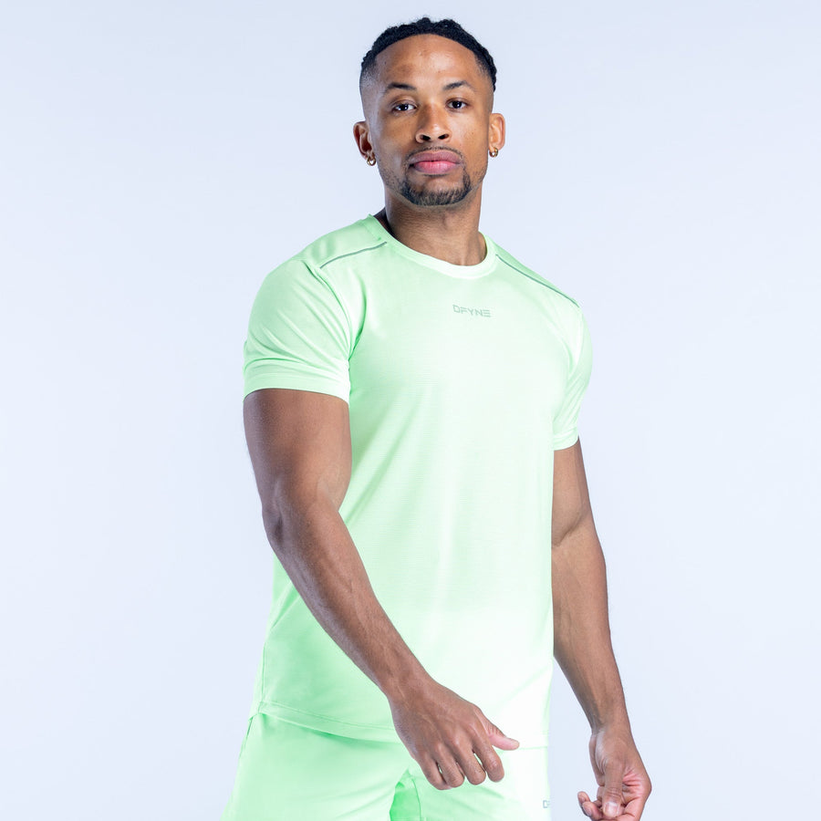Light green short-sleeve active top with crew neck and small chest logo