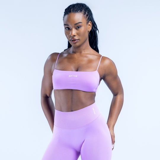 Purple strappy sports bra with thin adjustable straps and wide underband