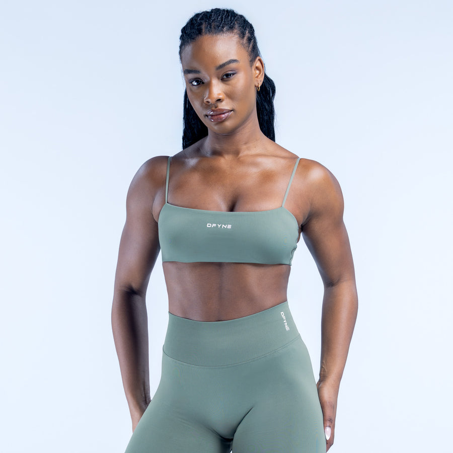 Strappy bra in sage green with thin adjustable straps and front logo