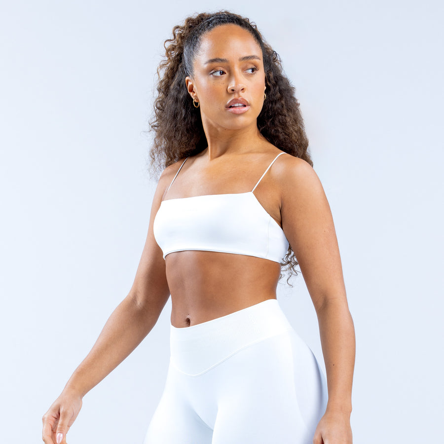 White strappy bralette with thin spaghetti straps and straight neckline