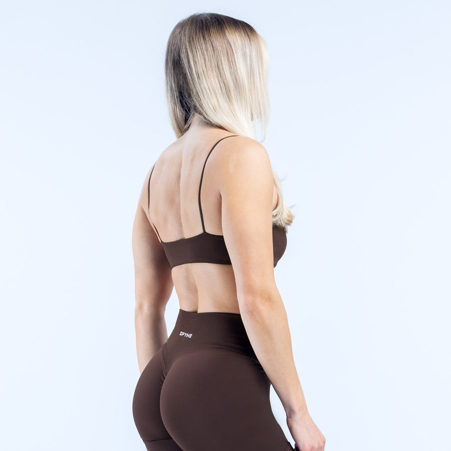 Black strappy bra back view with thin straps and wide band