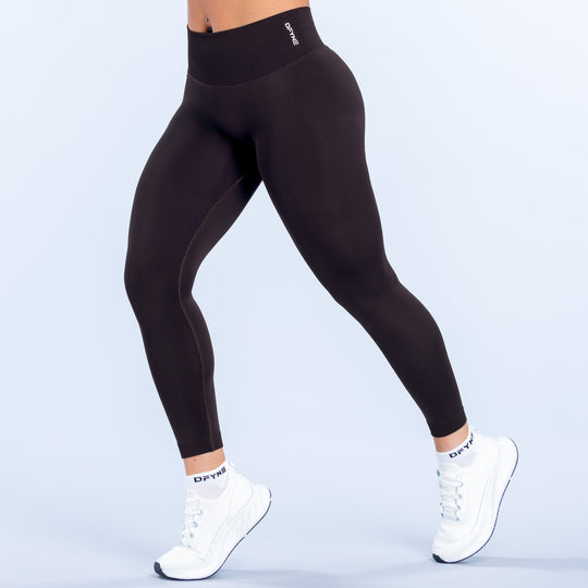 Defy leggings, black high-waist ankle-length with small logo at waistband