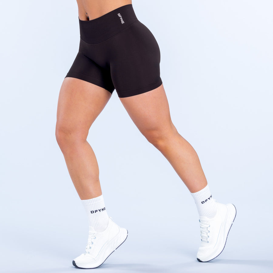 4.5-inch black athletic compression shorts, side view