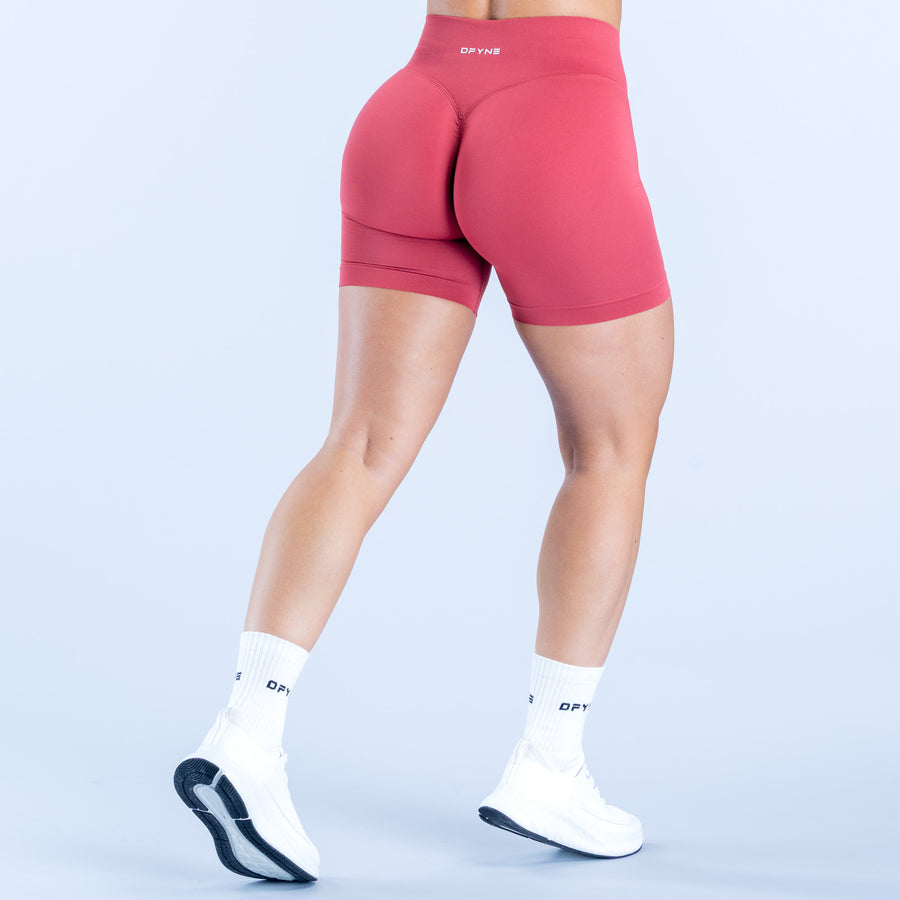 4.5-inch pink shorts, back view with sculpted seams and mid-thigh length