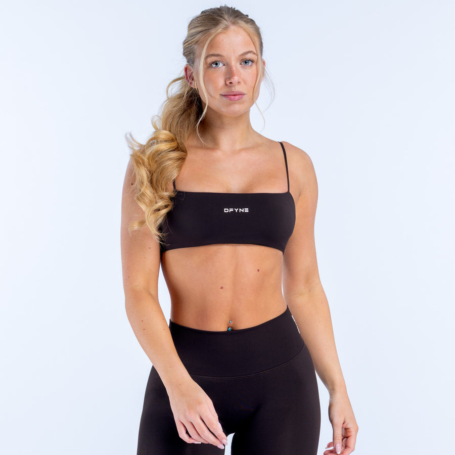 Black strappy bra with thin straps and rounded neckline, secure underband