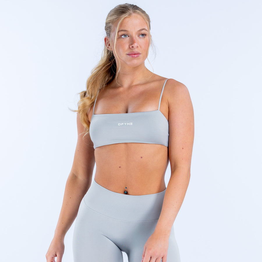 Light blue strappy bra with thin adjustable straps and padded cups