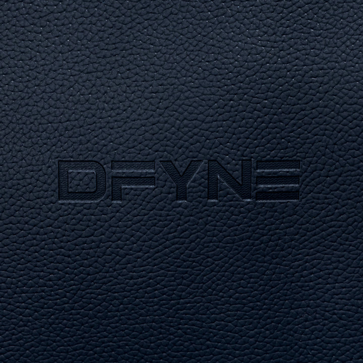 Duffle bag embossed logo on dark textured surface
