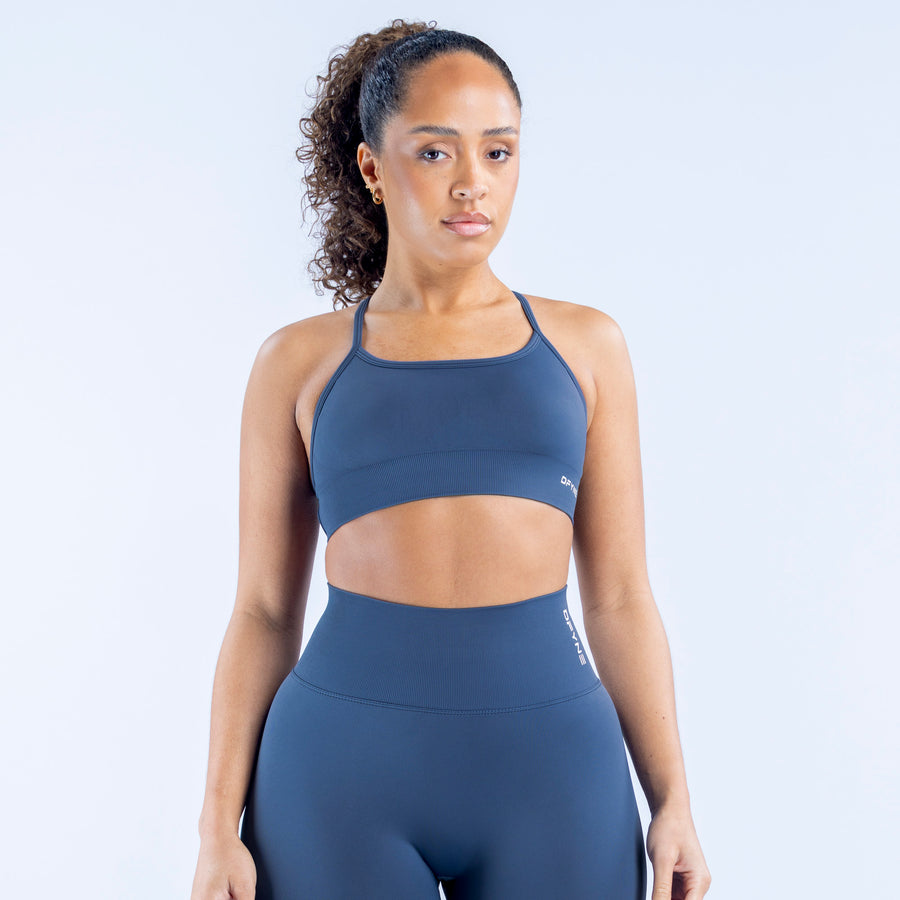 Navy backless sports bra with scoop front and thin straps