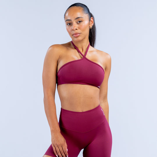 Dynamic high-neck halter bra in dark berry, high neckline with cross straps