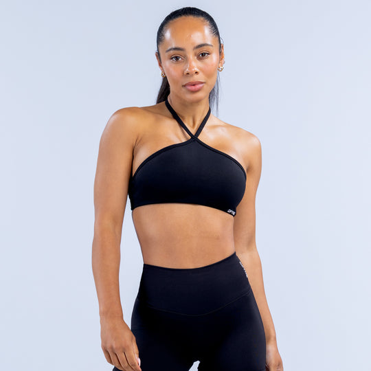 Dark high-neck halter bra with crisscross straps and racerback cut