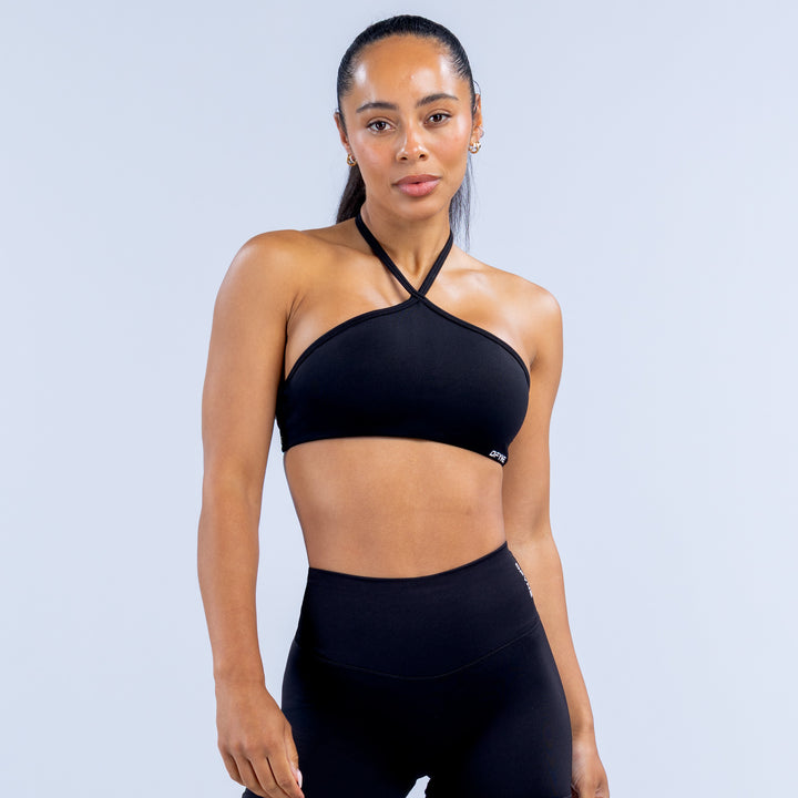 Dark high-neck halter bra with crisscross straps and racerback cut