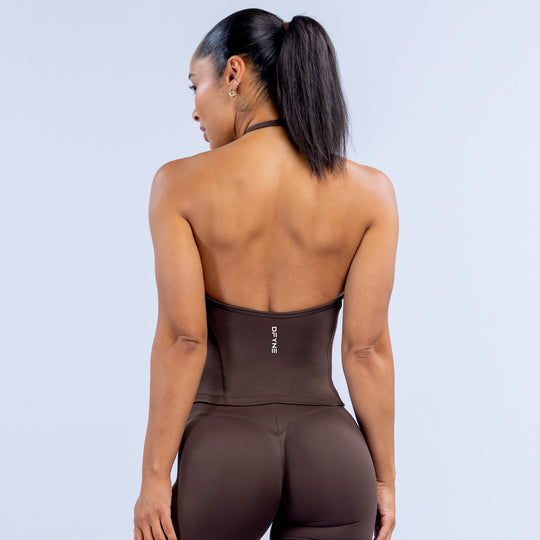 Dark brown longline halter top, open back with crisscross straps and small logo