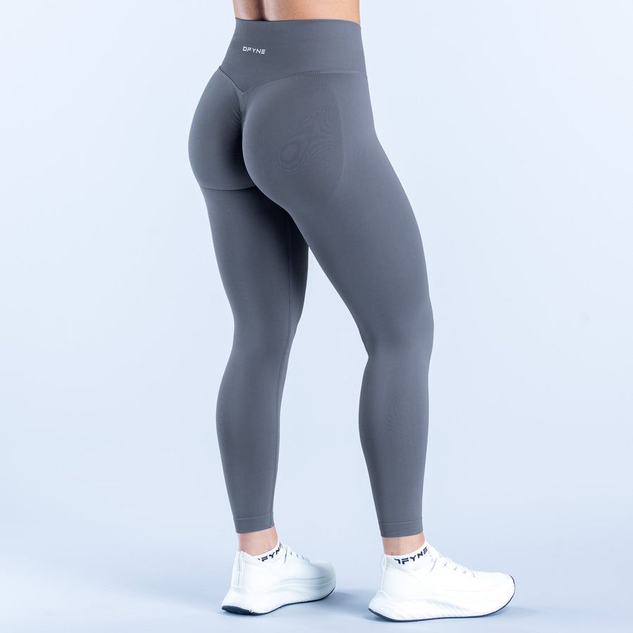 Dark gray leggings, front view, ankle length, smooth stretch fabric, subtle logo