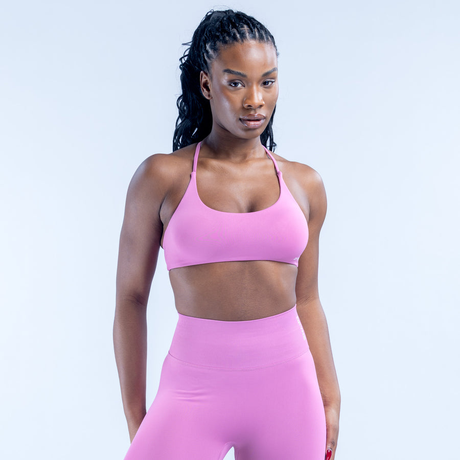 Dynamic Twist Back bra in pink with scoop front and adjustable straps