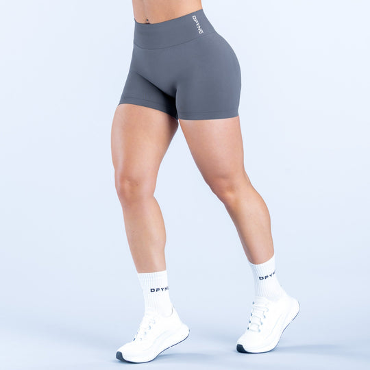 Dark gray 4.5-inch performance shorts, snug fit, elastic waistband, printed logo.