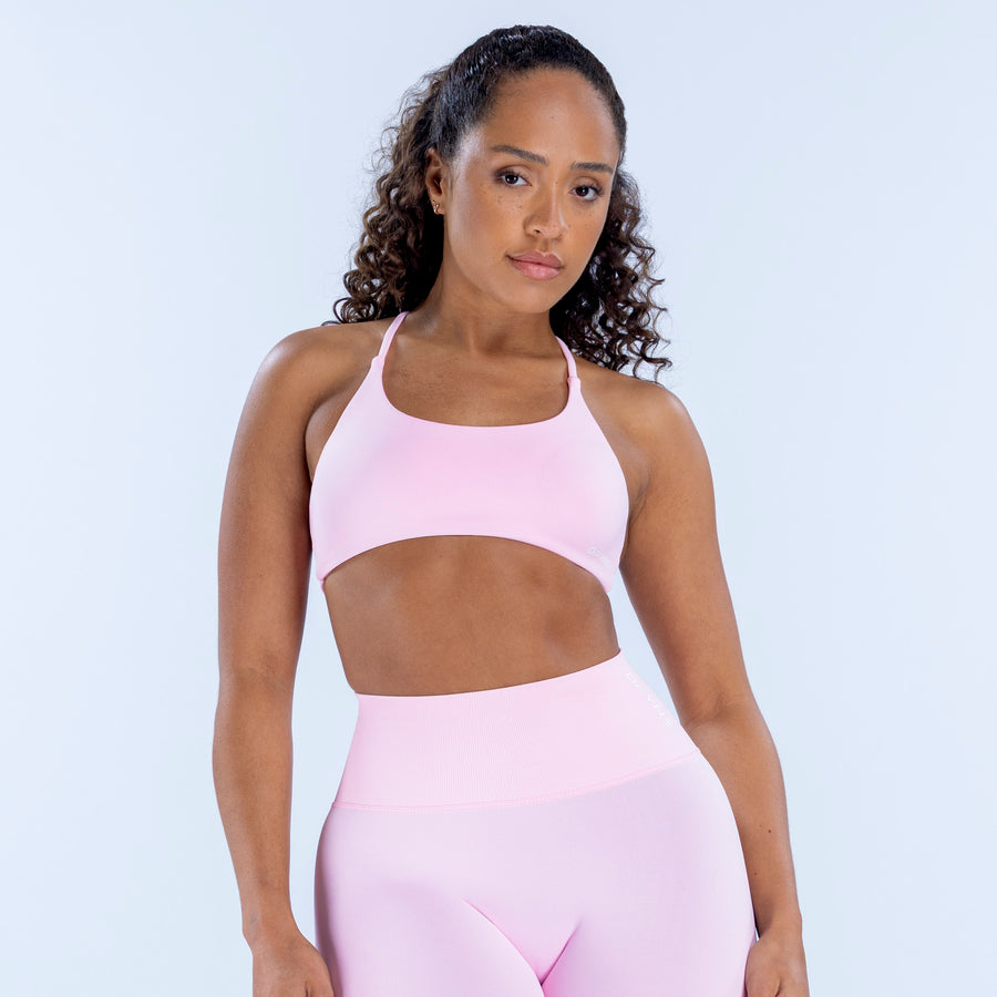 Twist-back bra with wide racerback straps, light pink