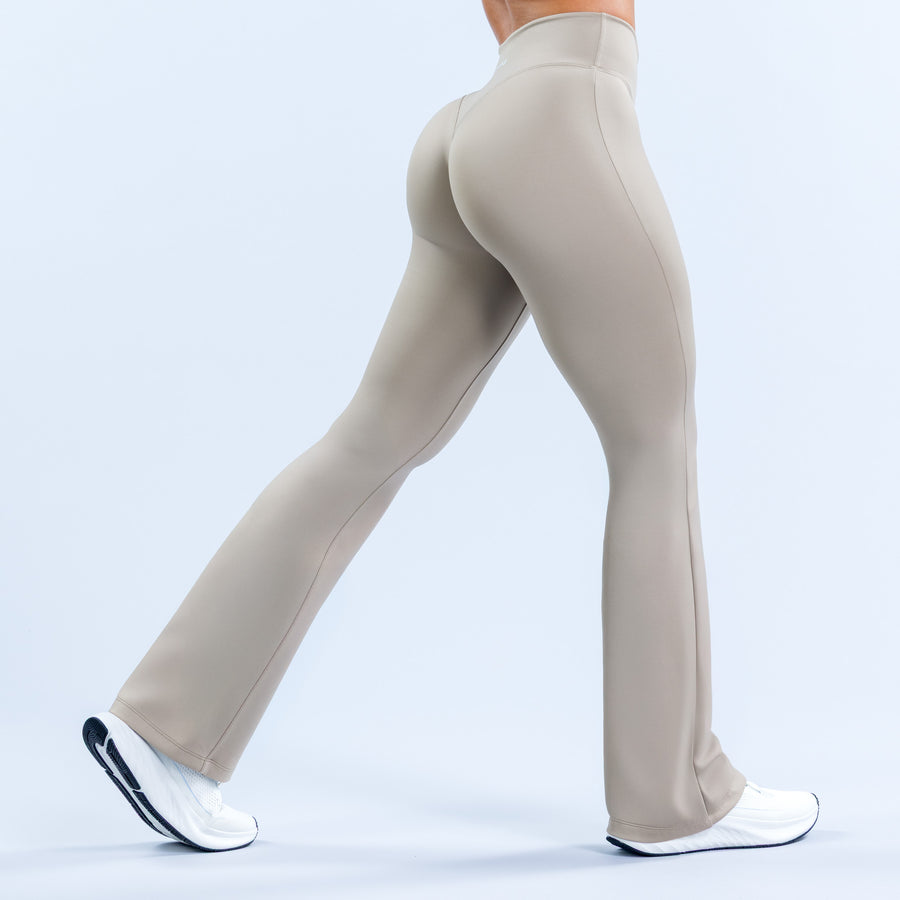 Hannah Pearson flare pants in light beige with flared leg and smooth fit