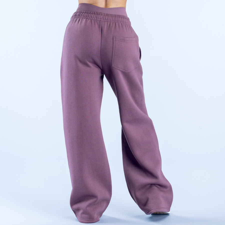 Plum wide-leg jogger pants with elastic waistband and side seams, full-length view