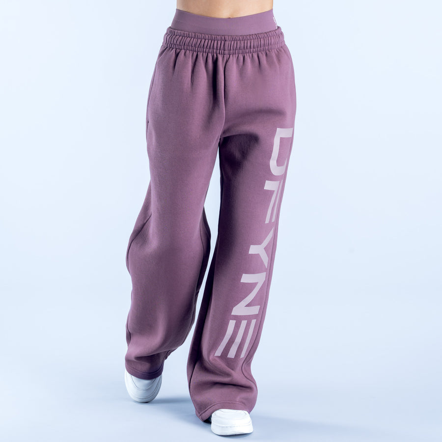 Plum wide-leg jogger pants with elastic waistband and vertical side logo detail