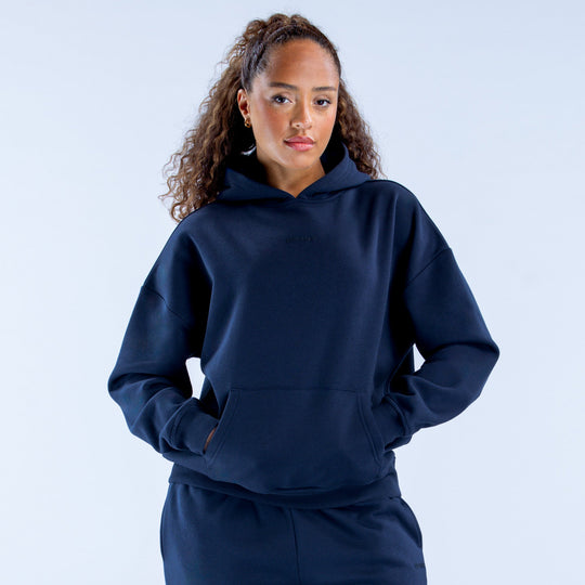 Dark navy pullover hoodie with hood and kangaroo front pocket, long sleeves