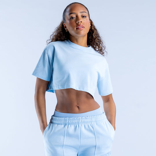 Light blue cropped crew-neck tee with short sleeves
